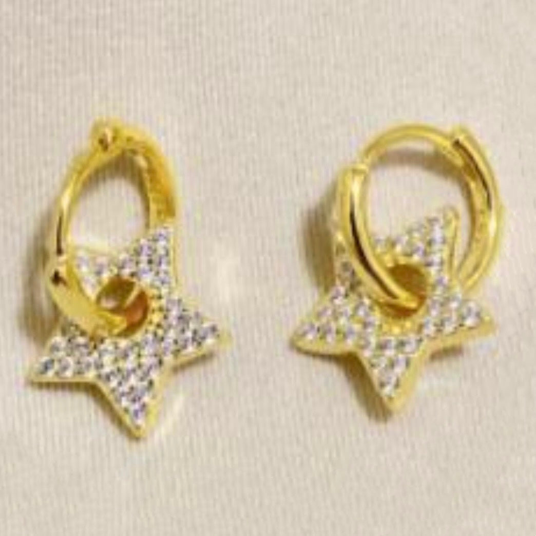 Star charm huggies earrings